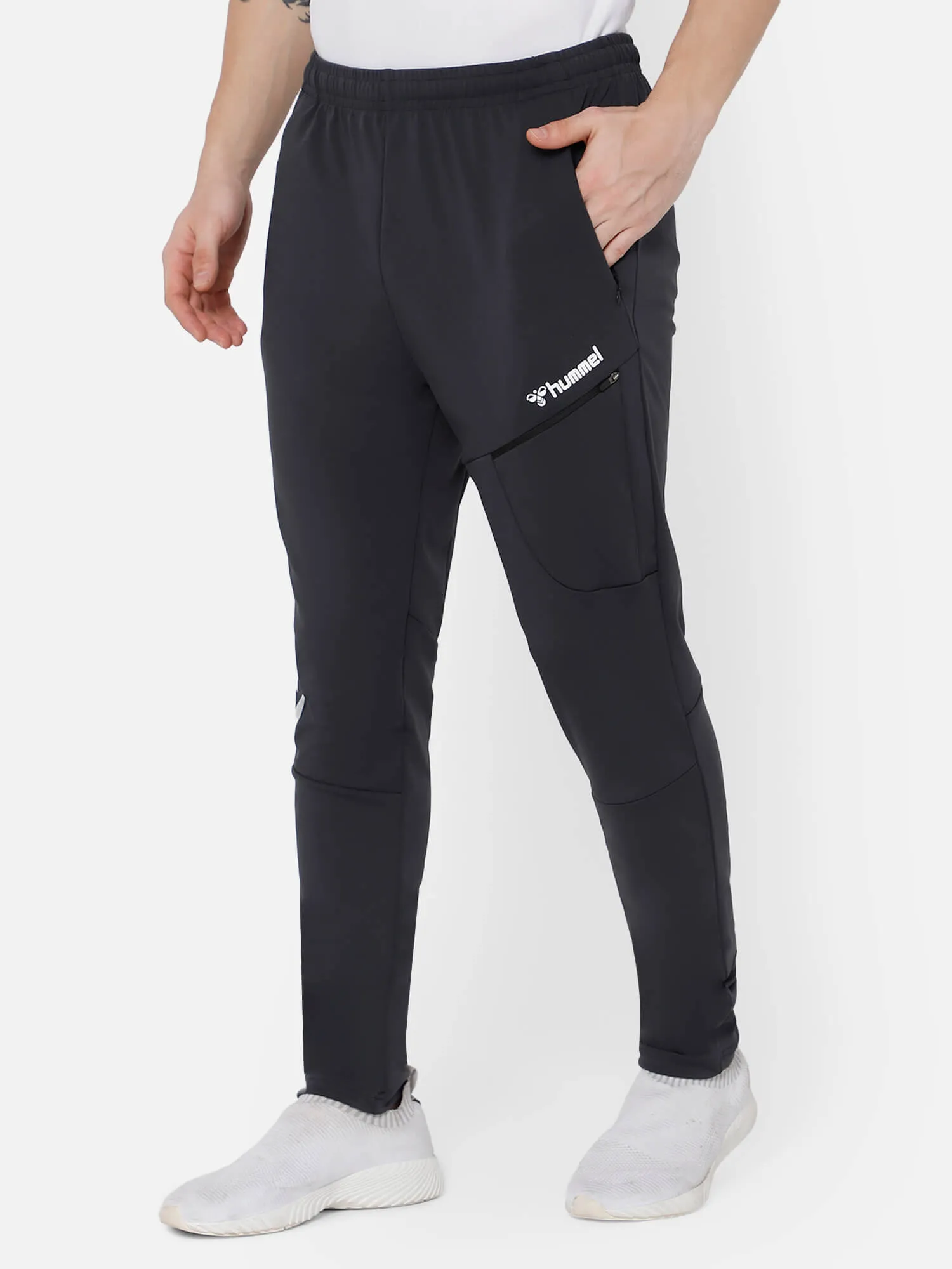 Football Solid Regular fit Polyester Trackpants for Men with zipper pockets Comfortable Breathable Fabric Stretchable for Everyday Use Ideal for Yoga Training Gym Running or Performance